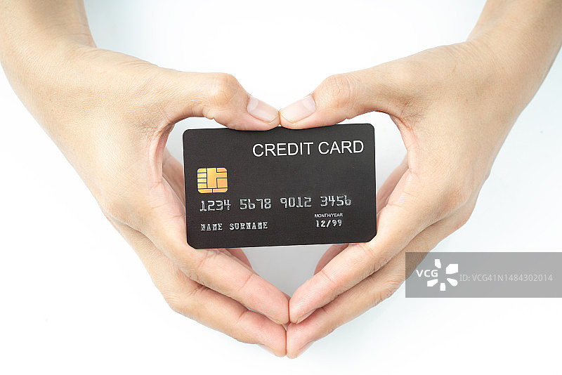 手持心形信用卡（白色背景）图片素材