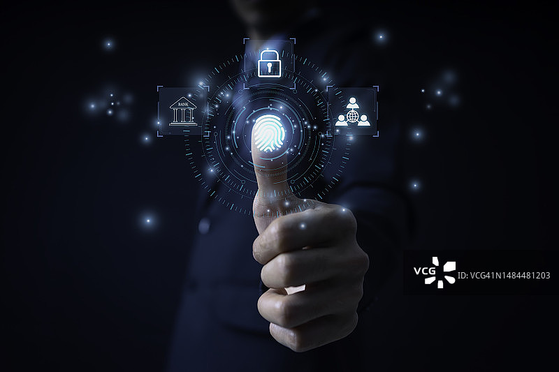 商人指向指纹扫描以提供安全访问图片素材