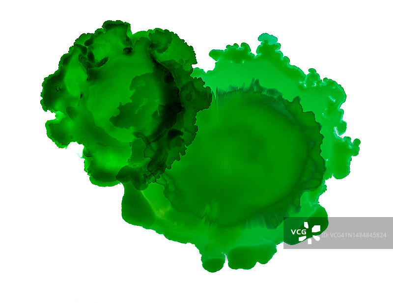 滴落在白色背景上的绿色油漆图片素材