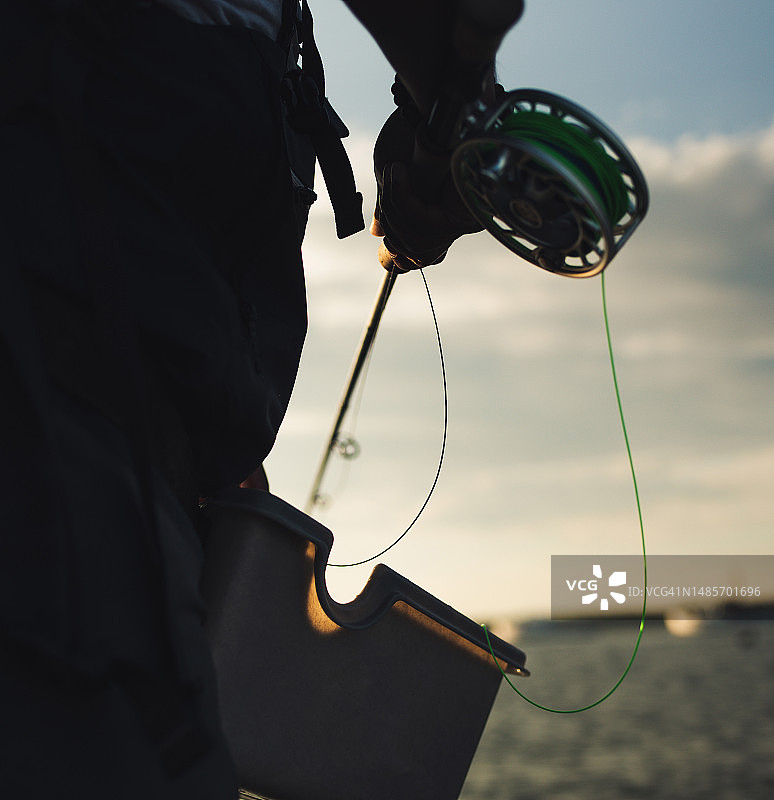 盐水飞蝇钓竿和渔轮特写镜头图片素材