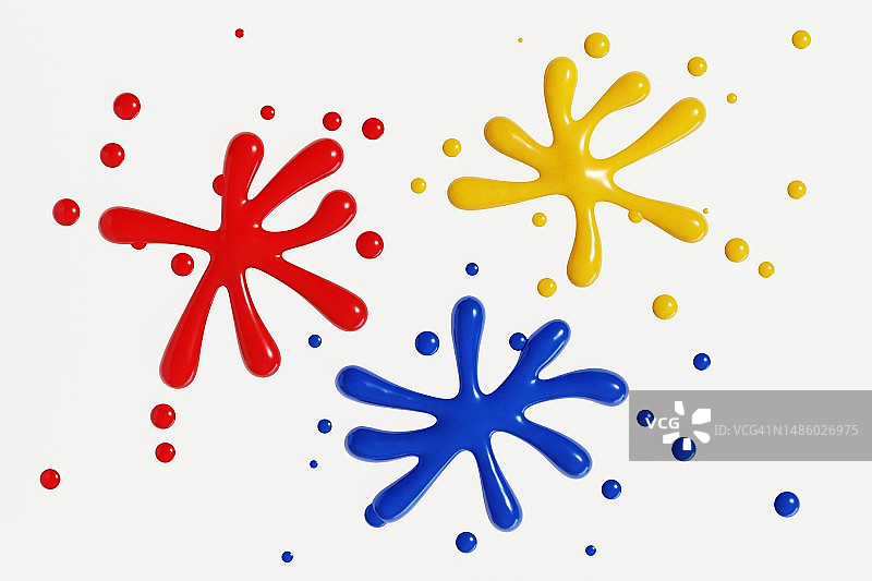 白色背景上的原色飞溅绘画图片素材