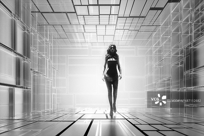 年轻女人行走在未来感十足的走廊中图片素材