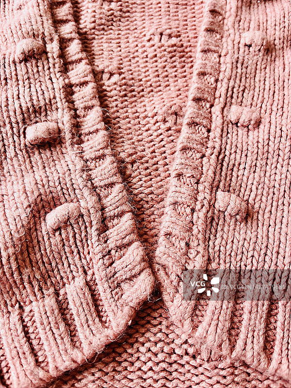 温暖的针织毛衣纹理。年度流行色图片素材