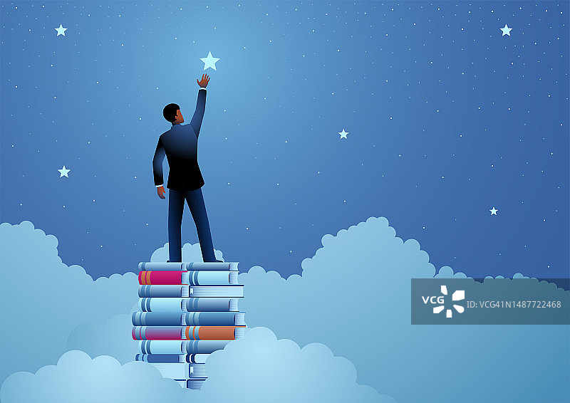 非裔男子以书为平台摘星的商业概念图片素材