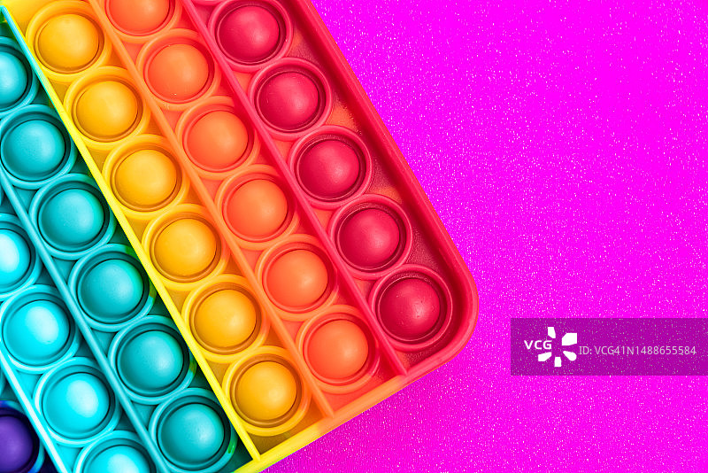 彩虹色指尖泡泡玩具，抗压益智图片素材