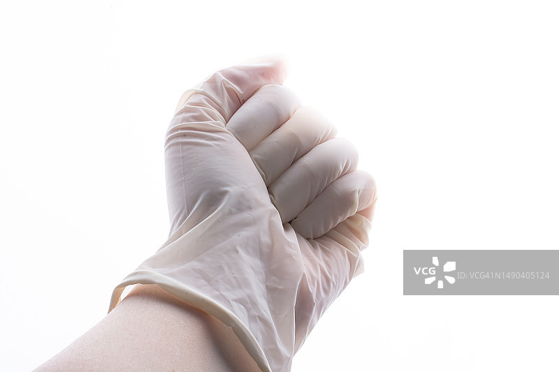 戴上无菌乳胶防护手套以提供保护，土耳其图片素材