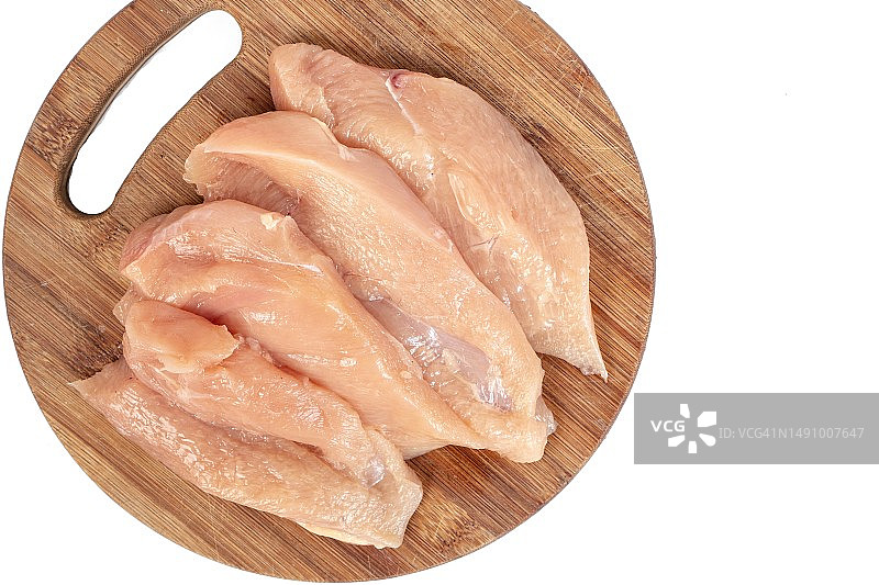 木板上的生鸡胸肉，留白，罗马尼亚图片素材