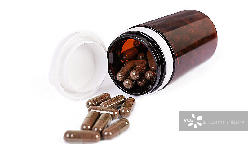 药瓶和散落的药丸图片素材
