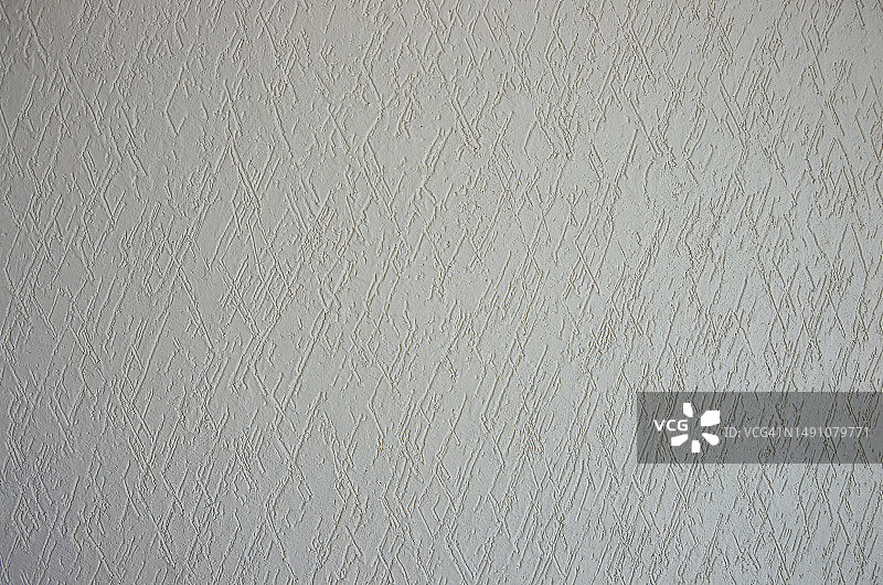 白色内墙灰泥墙上的对角交叉阴影纹理图片素材