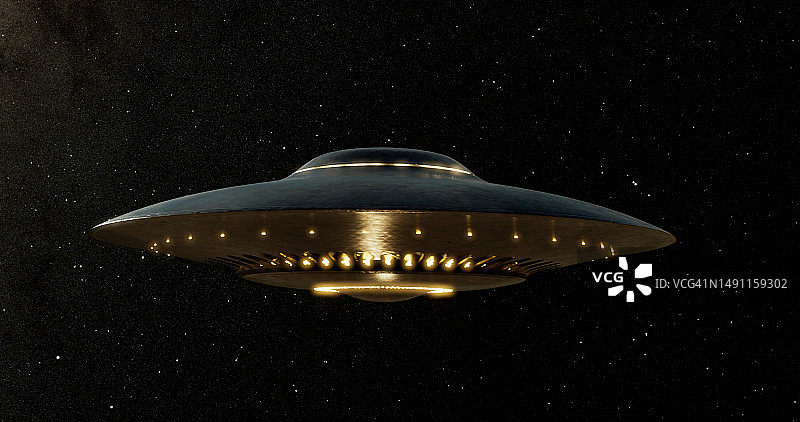 宇宙中盘旋的不明飞行物图片素材