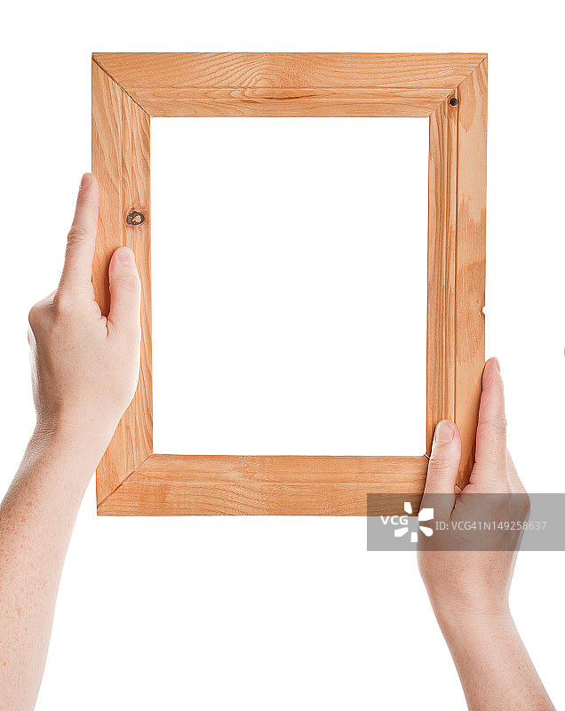 手中的木制框架图片素材