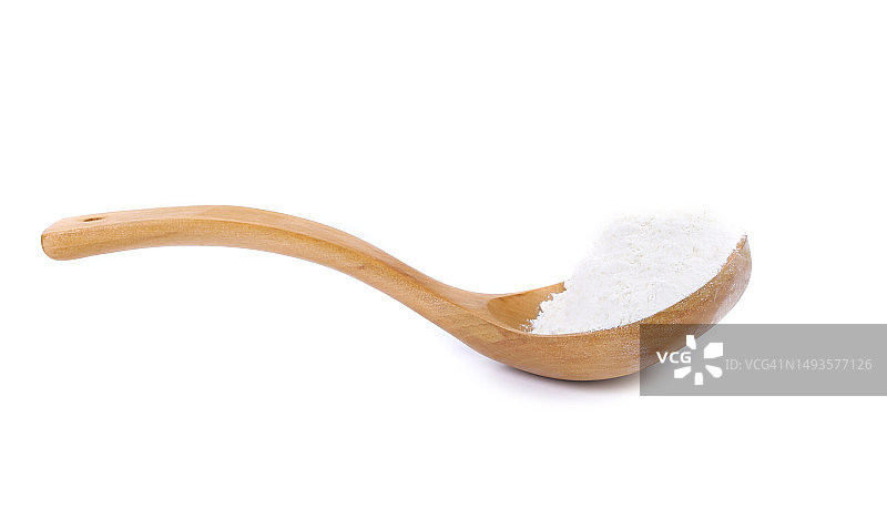 孤立的木勺上的面粉图片素材