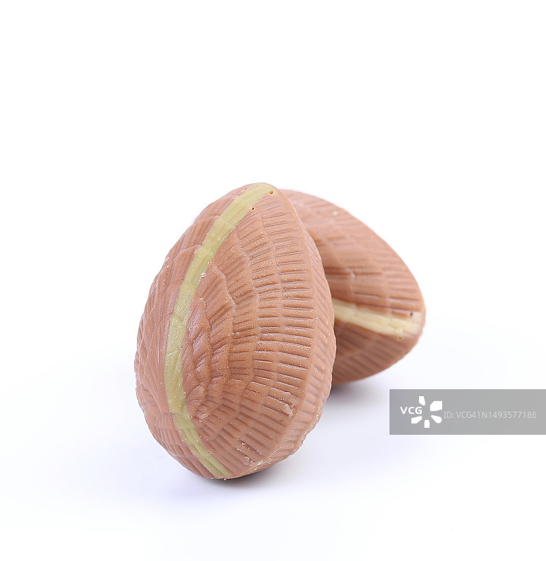 白色背景上的木勺特写图片素材