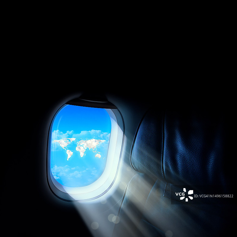 旅行概念：飞机舷窗与世界地图图片素材