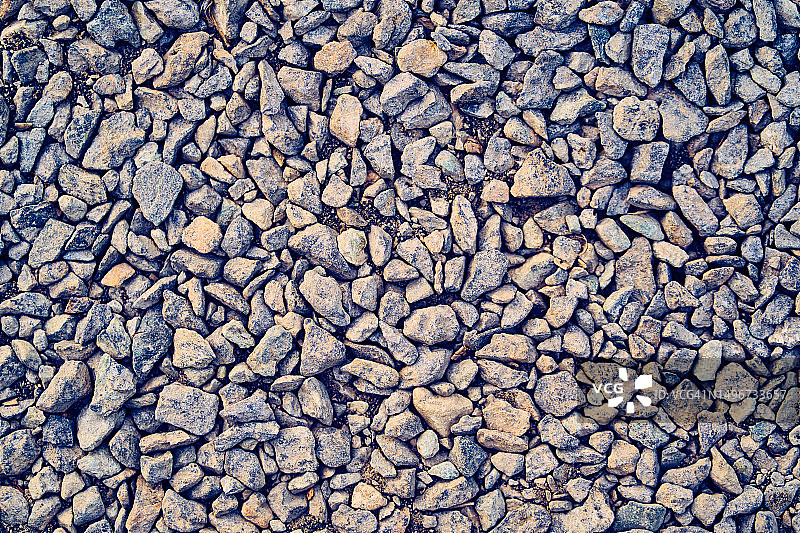 地面上的花岗岩碎石，带有复制空间的背景图片素材