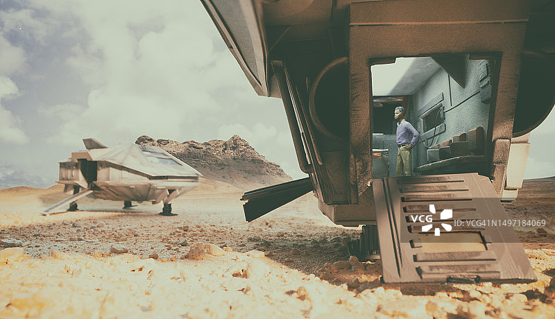 尘土飞扬的星球上的两艘宇宙飞船图片素材