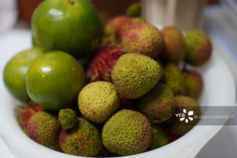 橙色荔枝和红毛丹图片素材