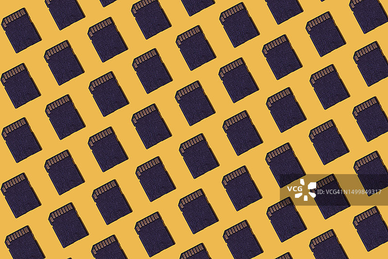 黄色背景上的黑色SD存储卡图案图片素材