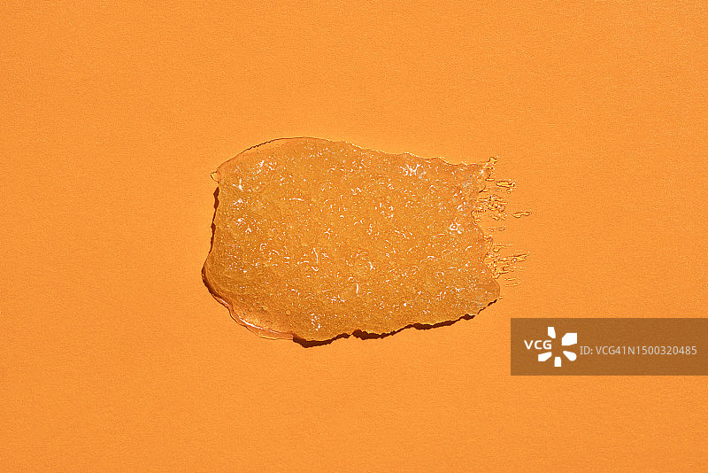 橙色糖身体磨砂膏的化妆品色板，面部和身体护理的美容天然化妆品概念图片素材