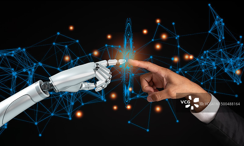 男人与机器人握手：人工智能技术与人类连接的概念。未来商业合作图片素材