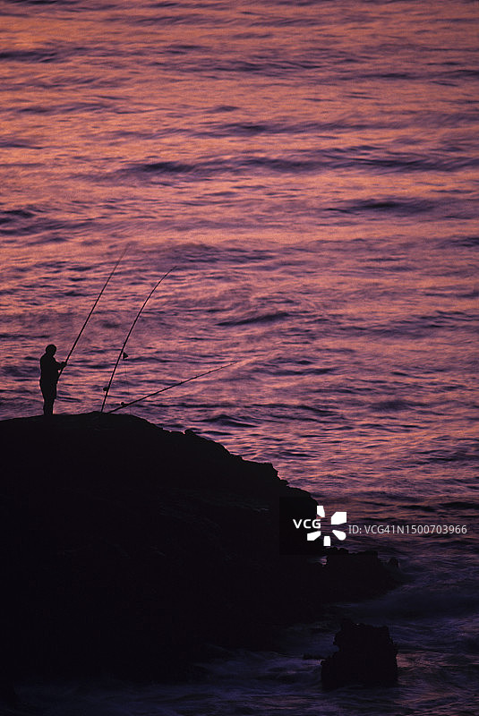 夏威夷瓦胡岛马卡普吾角日落时分垂钓图片素材