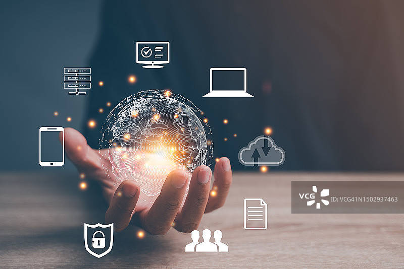 手持虚拟全球互联网连接元宇宙：商业、金融、银行、数字链接技术和大数据图片素材