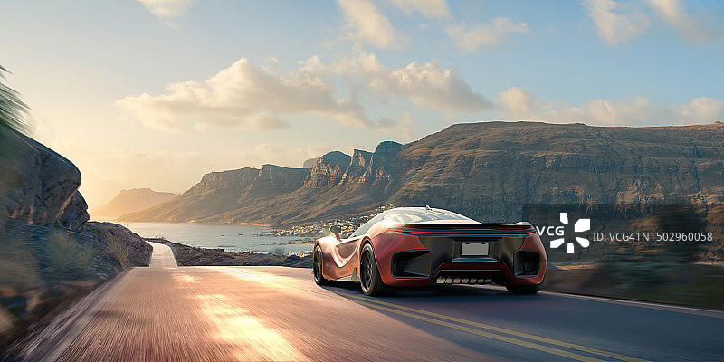 行驶在沿海公路上的电动跑车图片素材