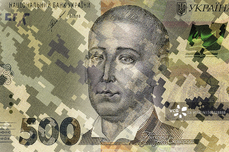 乌克兰军队迷彩与500格里夫纳纸币背景图片素材