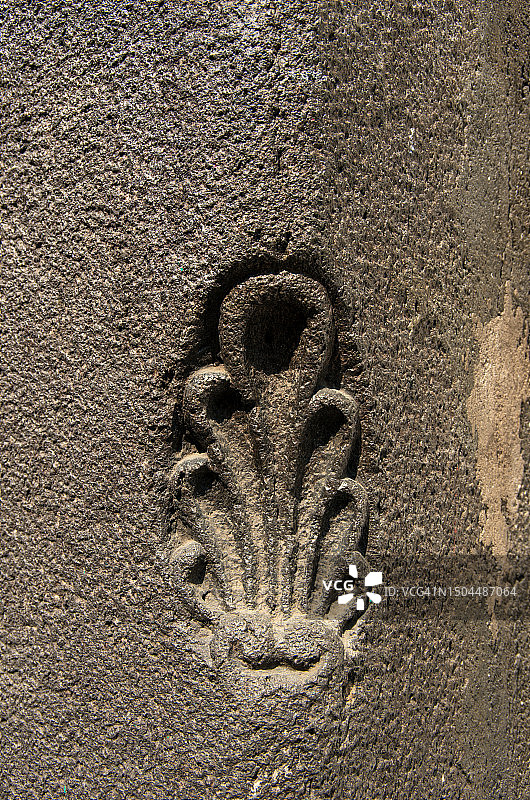 殖民建筑外墙石墙上抽象的环状浮雕雕刻图片素材