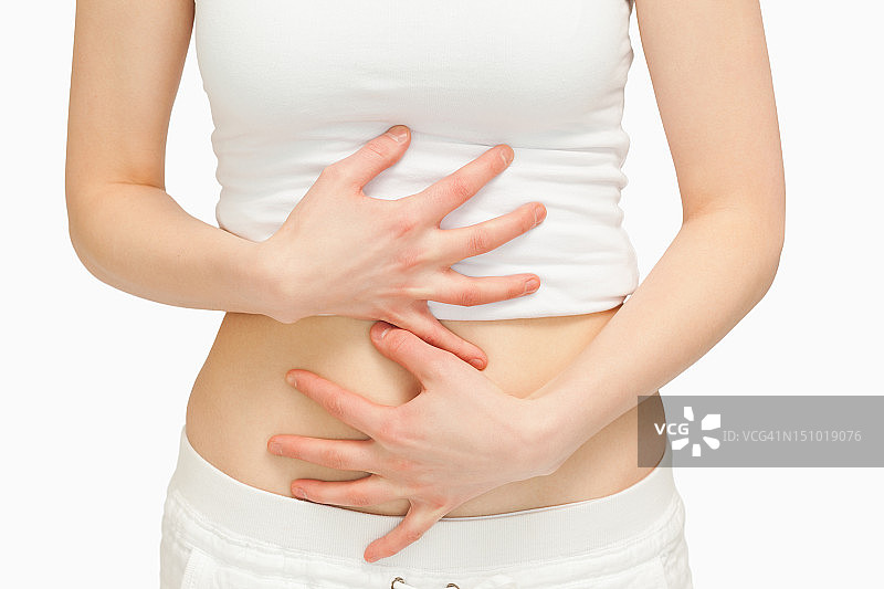 女人用手触摸腹部图片素材