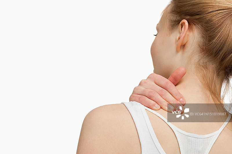 女人按摩疼痛的颈部图片素材