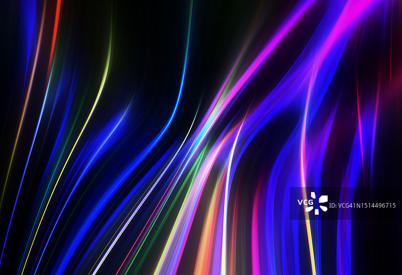 黑色背景上的椭圆形霓虹灯光轨迹图片素材