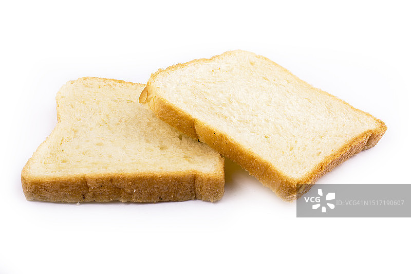 白色背景上的面包片特写图片素材