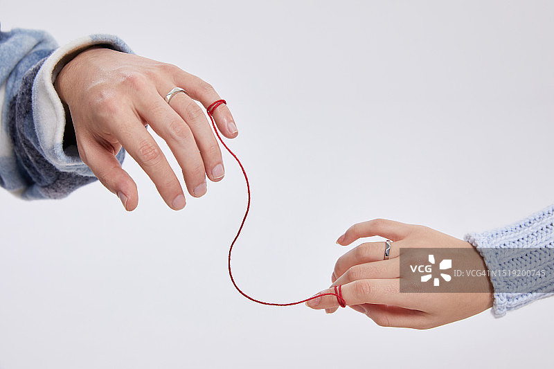 情侣手持线图片素材