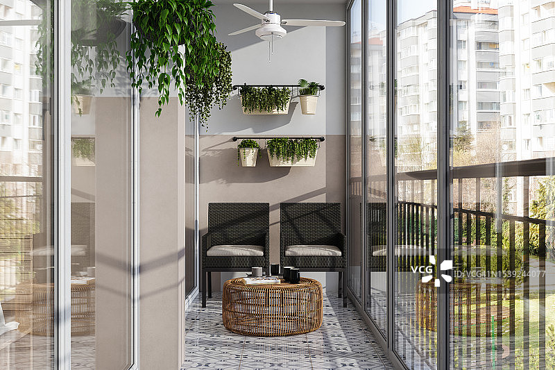 带藤椅、咖啡桌和爬藤植物的现代封闭式阳台图片素材