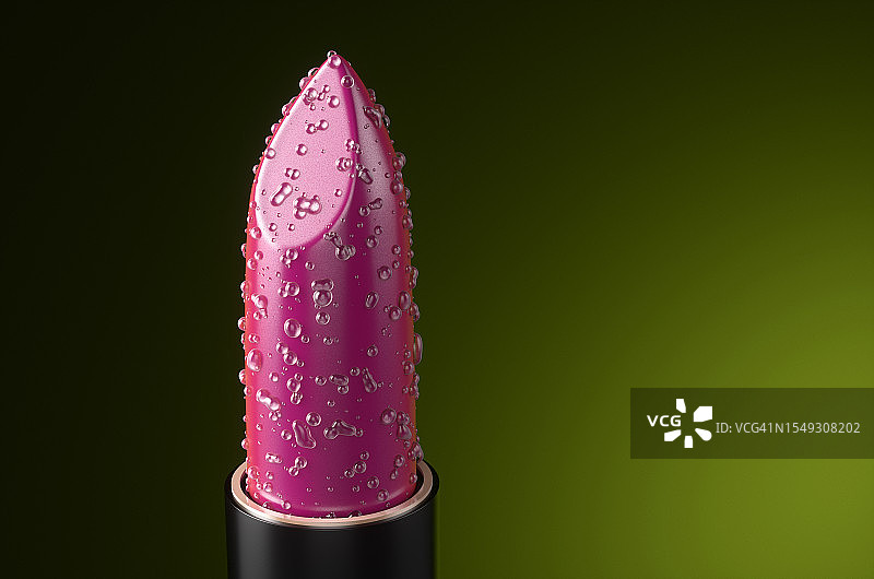 绿色背景上的红色口红水滴特写图片素材