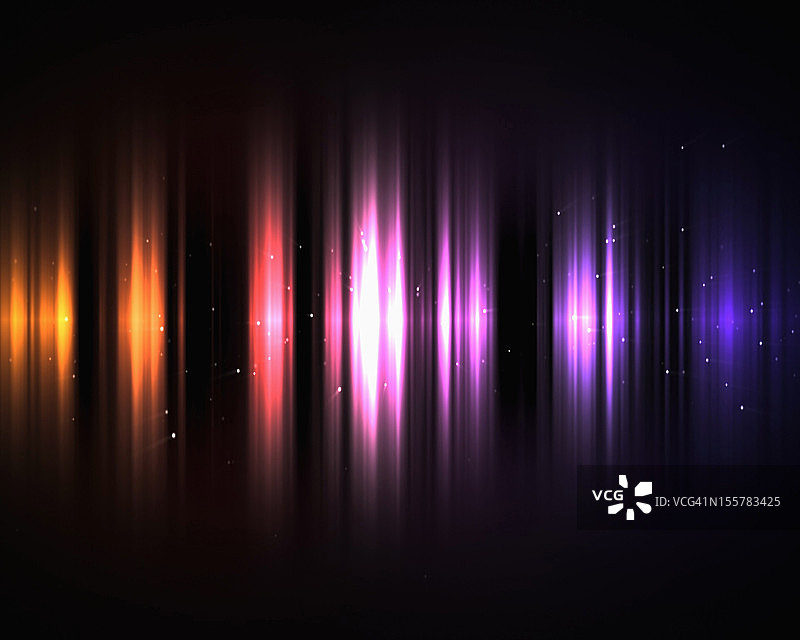 黑暗中从橙色到紫色的光图片素材