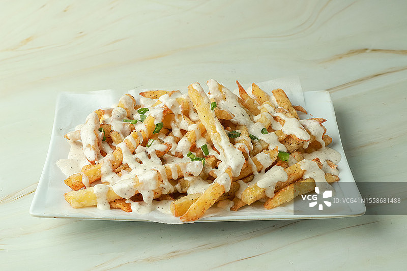 蛋黄酱蒜香炸薯条图片素材