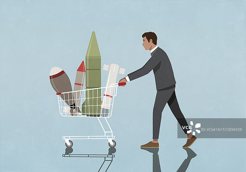 商人用购物车购买火箭和导弹图片素材