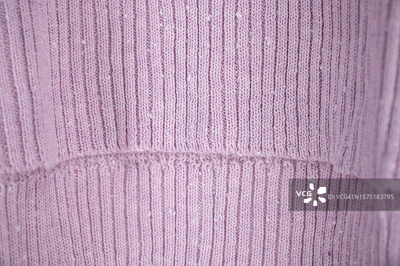 针织粉色保暖毛衣特写纹理图片素材