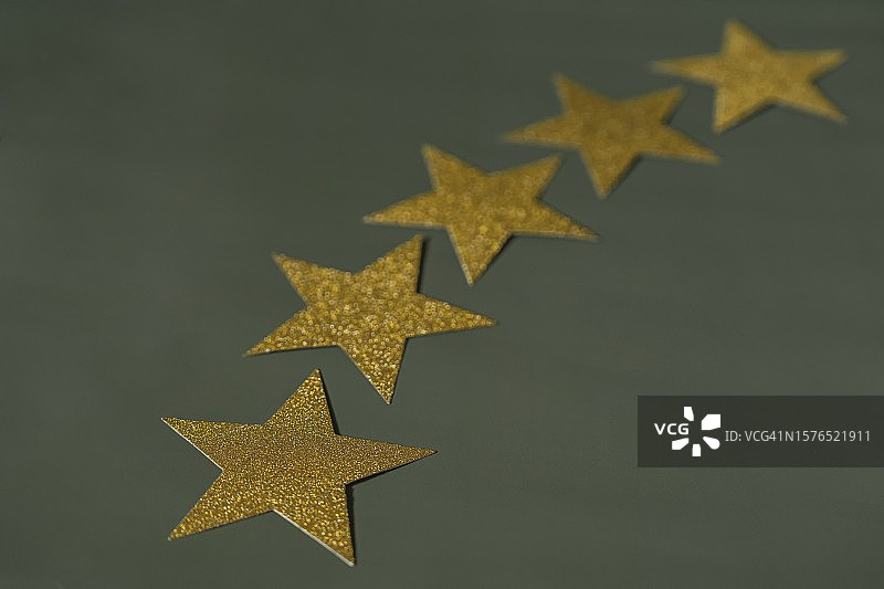 卓越概念：金星，五星，评论，评级满意度概念图片素材