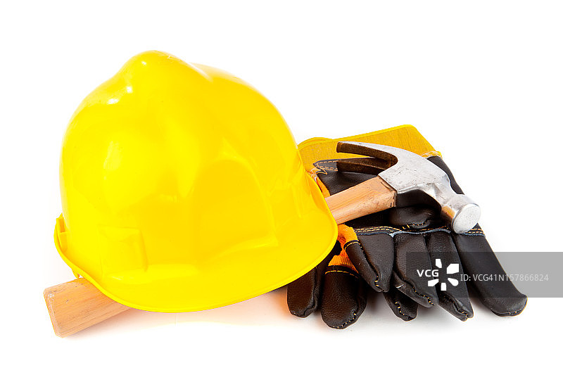 带锤子和安全帽的防护手套图片素材
