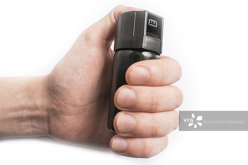 手持胡椒喷雾，白色背景图片素材