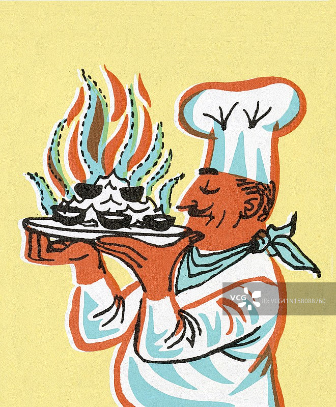 厨师拿着燃烧的拼盘图片素材