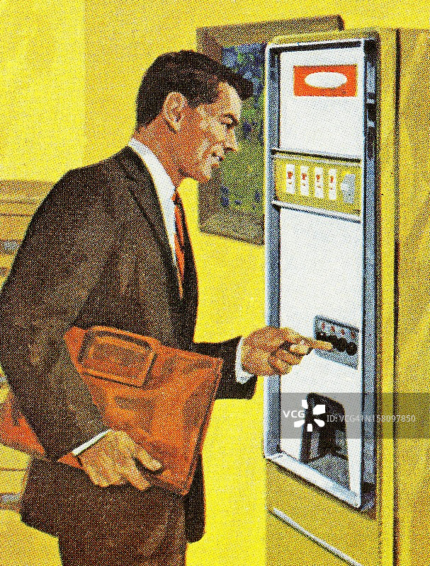 使用自动售货机的男人图片素材