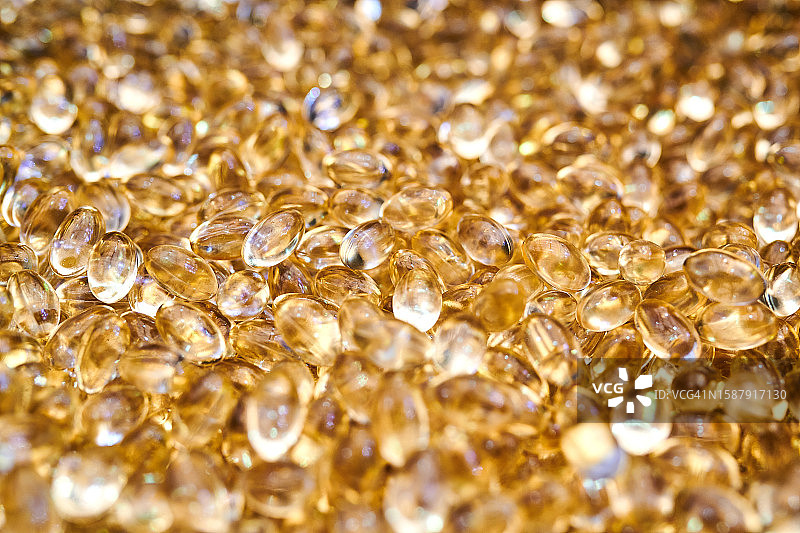 金色胶囊背景图片素材