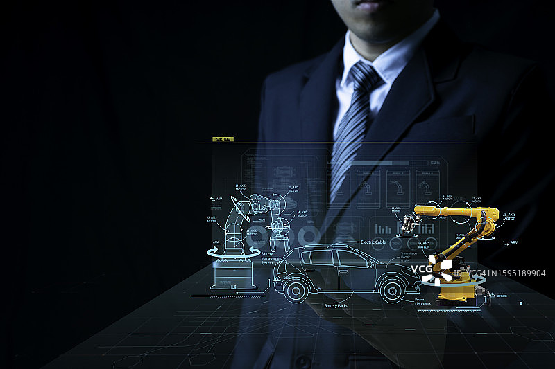未来主义汽车工程师利用增强现实进行3D全息模型设计图片素材