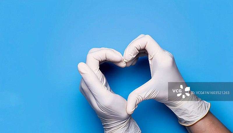 戴手套的手部特写，美国图片素材