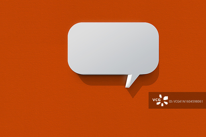 橙色表面上的对话气泡图片素材