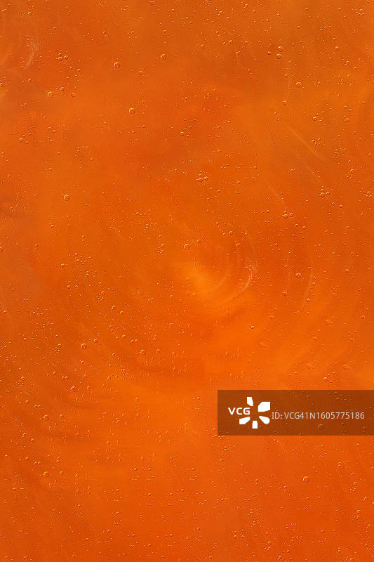 带有许多气泡的透明橙粉色凝胶质地图片素材